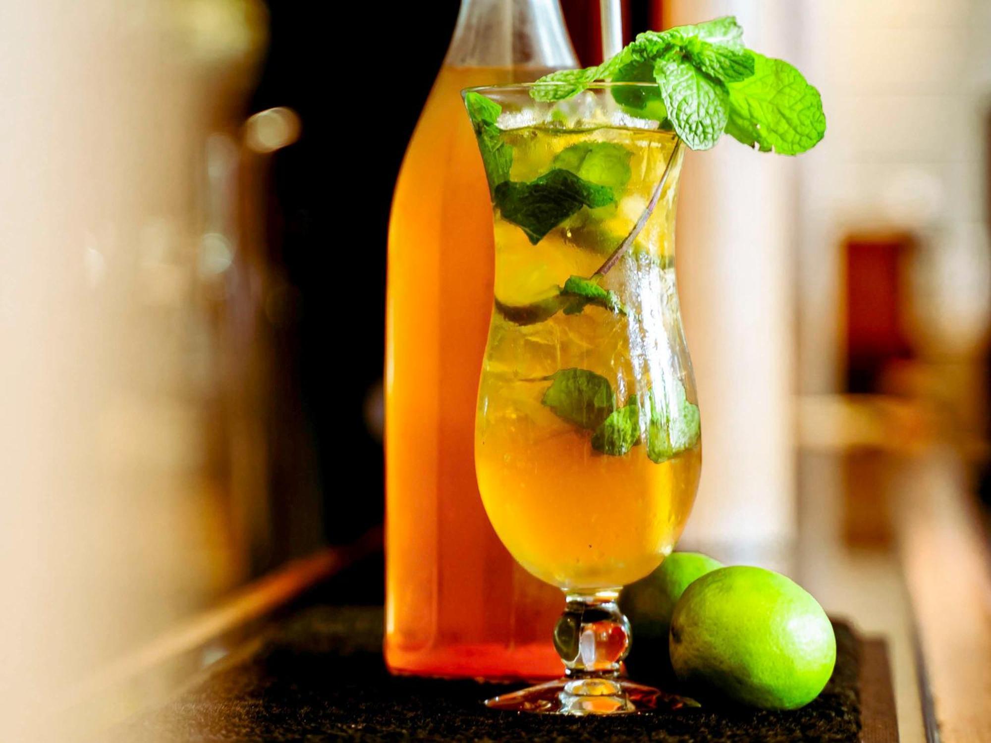 Pullman Cairns International Hotel Buitenkant foto A glass of ginger ale
