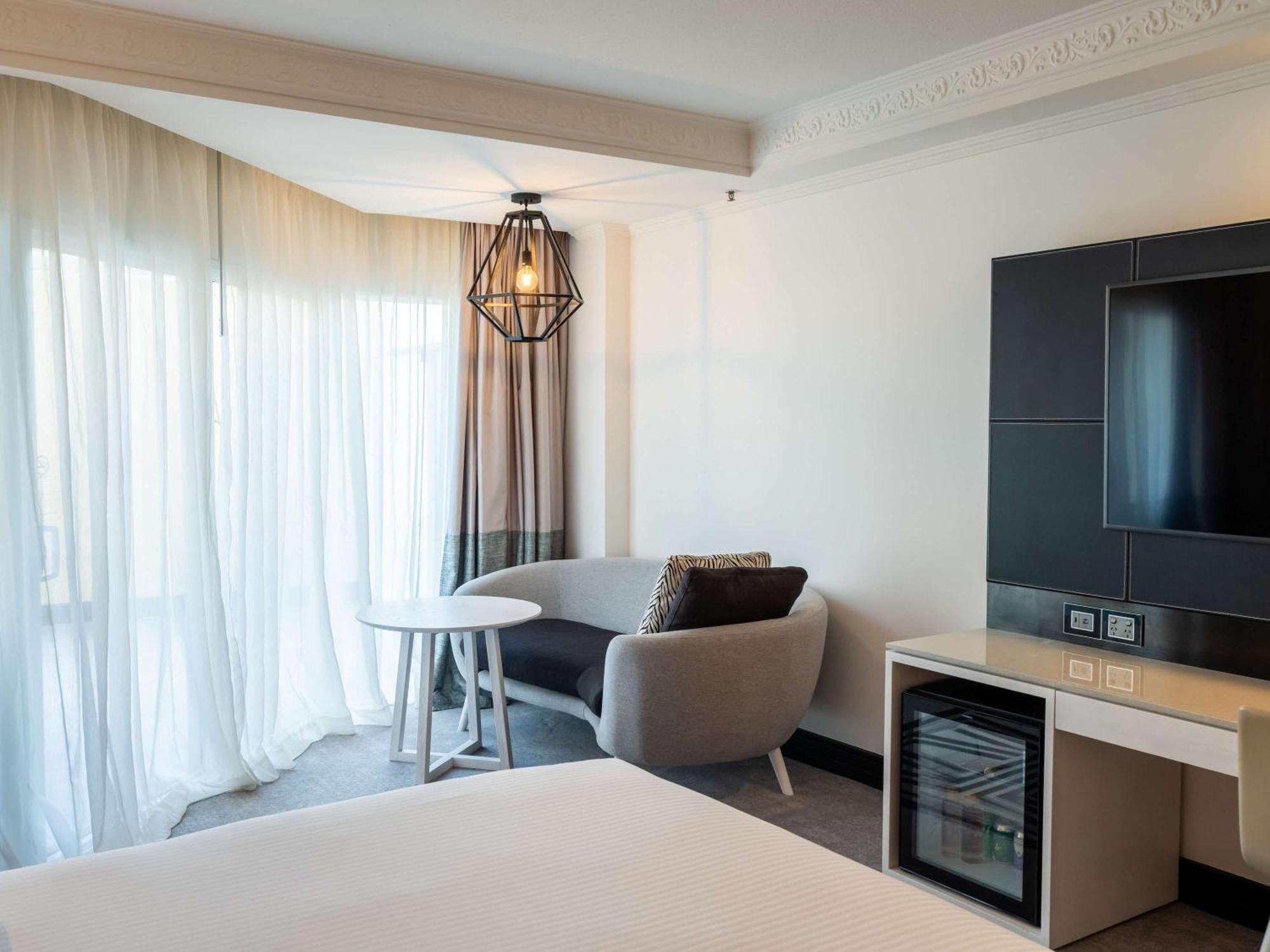 Pullman Cairns International Hotel Buitenkant foto A room at the hotel